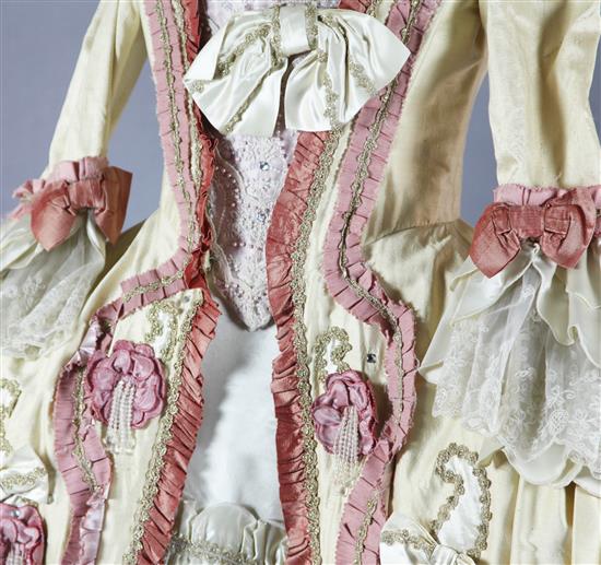 Countess Almavivas costume for The Marriage of Figaro. A cream silk dress, under skirt, looped petticoat and blonde